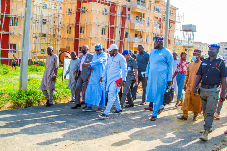 HONOURABLE MINISTER OF STATE WORKS AND HOUSING PROGRESS TOUR OF THE FHA MASS HOUSING ESTATE IN ZUBA, FCT